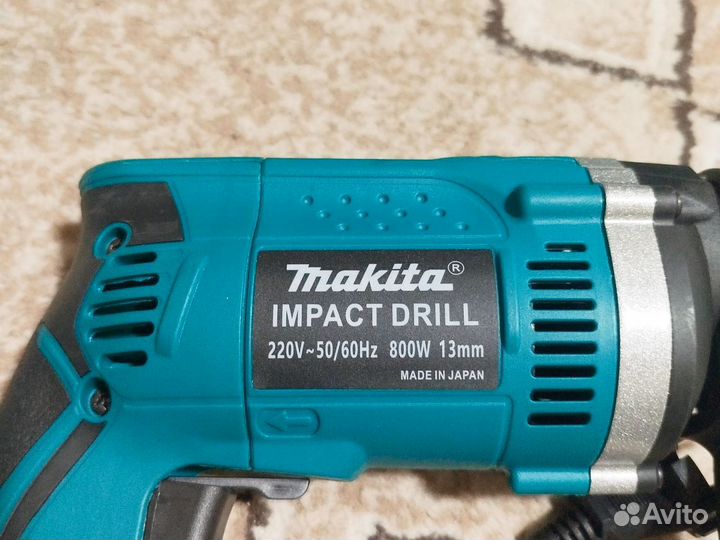 Ударная дрель makita