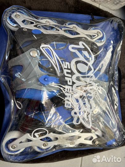 Роликовые коньки