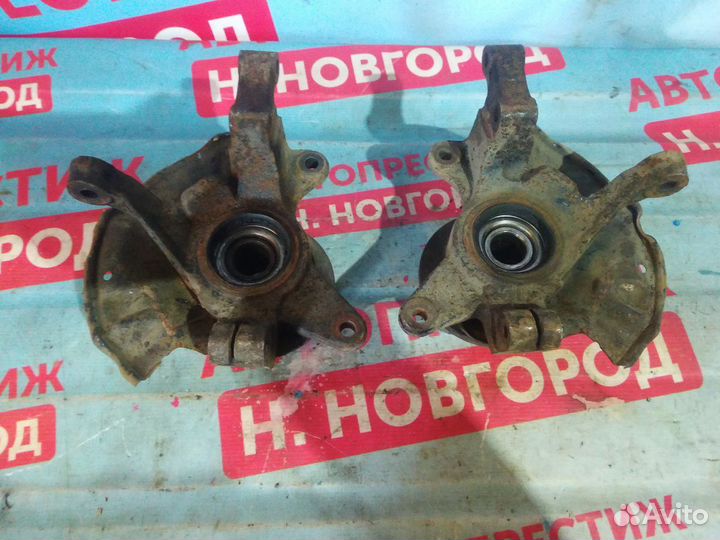 Кулак поворотный с ступицей Киа Спектра