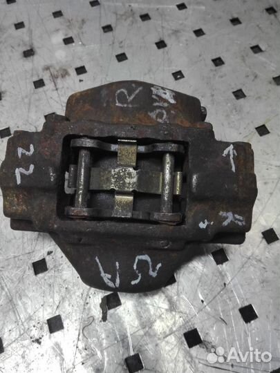 Суппорт задний правый Opel Omega