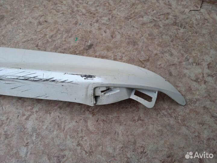 Клык бампера лев. зад. toyota crown
