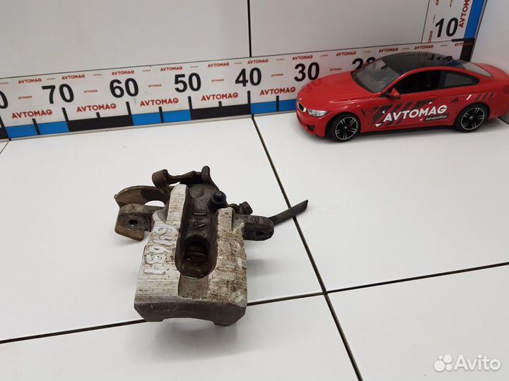 Суппорт задний правый (Toyota Corolla)
