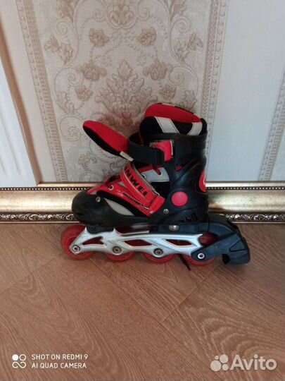 Роликовые коньки