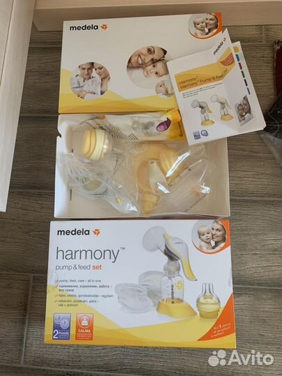 Молокоотсос medela harmony новый