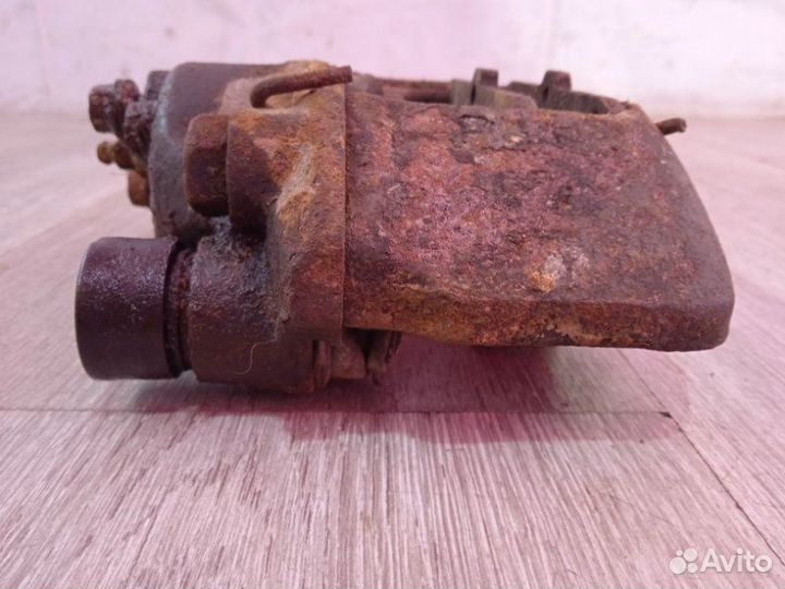 Суппорт передний левый Kia Rio DC A5D 2002