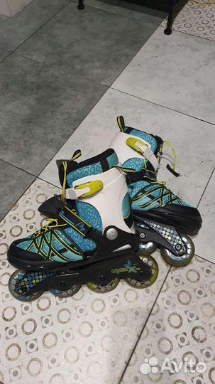 Роликовые коньки