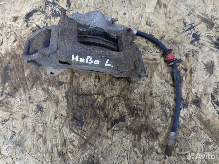 Передний левый тормозной суппорт Ваз Нива 21214