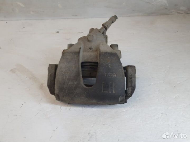 Суппорт передний левый Ford Focus 2 aoda 2006