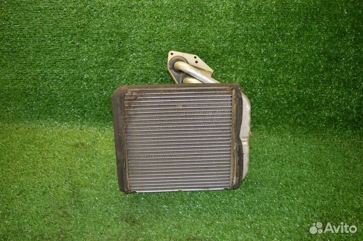 Радиатор печки Mitsubishi Carisma