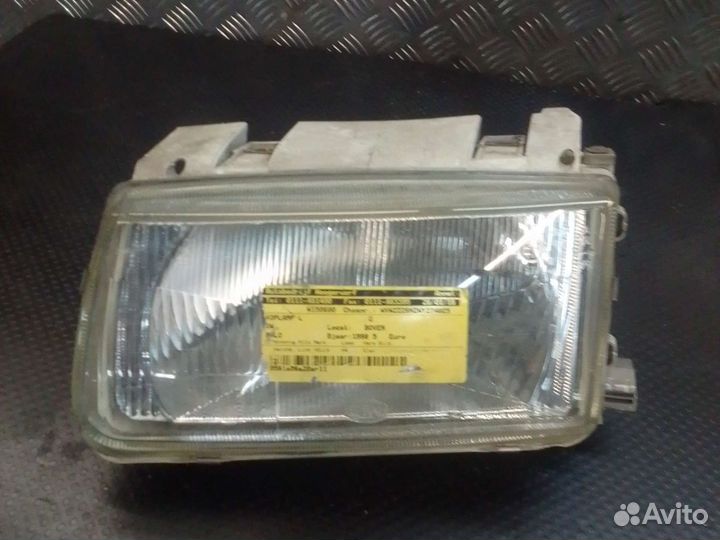 Фара левая Volkswagen Polo 3