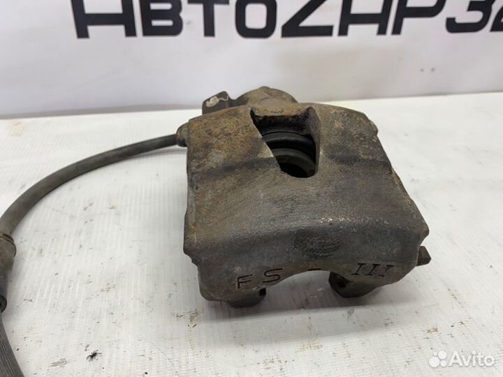 Суппорт тормозной передний левый Skoda Octavia A5