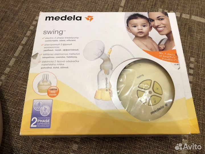 Молокоотсос medela электрический