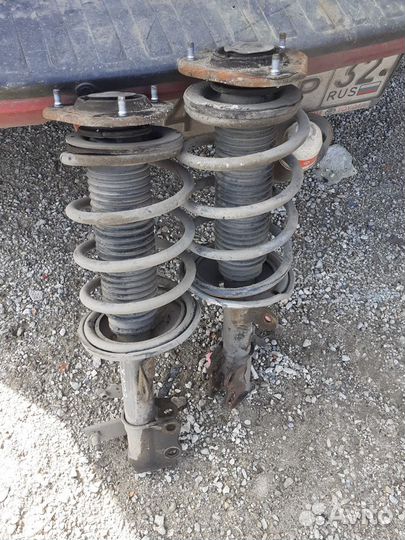 Передние стойки Geely Emgrand EC7