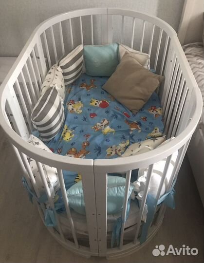 Детская кроватка с поперечным маятником