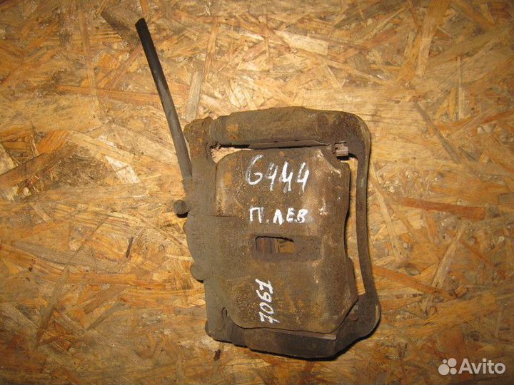 Суппорт передний левый Nissan Qashqai J10