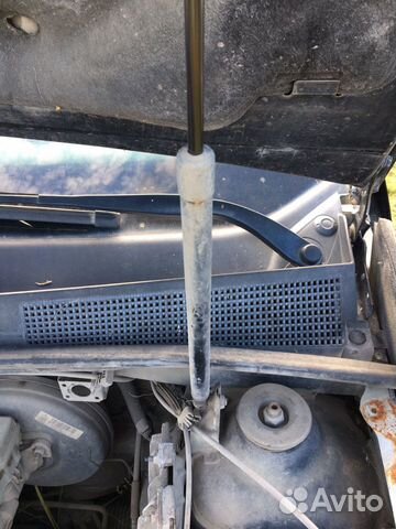 Амортизатор капота Рено Логан