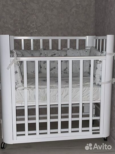 Бортики в кроватку новые