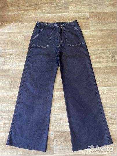 Джинсы клеш от бедра 44-46