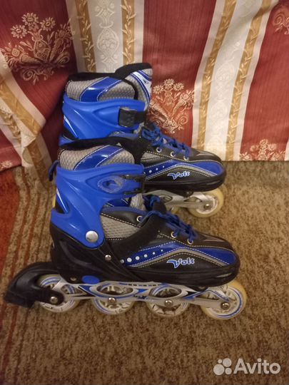 Роликовые коньки