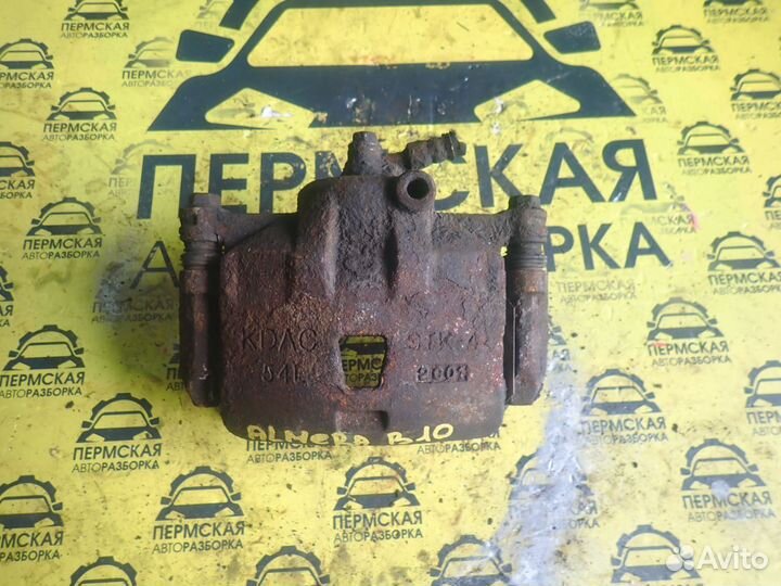 Суппорт тормозной передний левый Nissan Almera G15