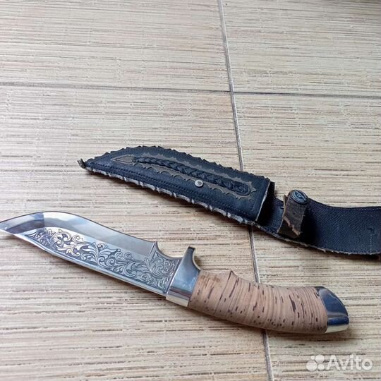 Нож