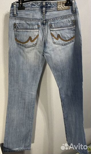 Джинсы клеш женские