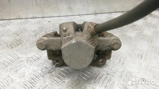 Суппорт тормозной задний левый toyota avensis T25