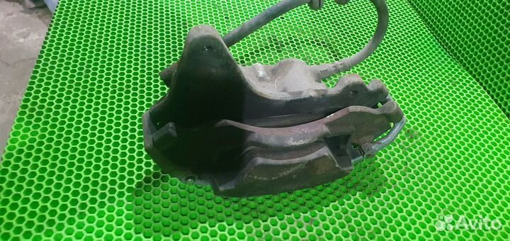 Суппорт тормозной передний правый Chevrolet niva