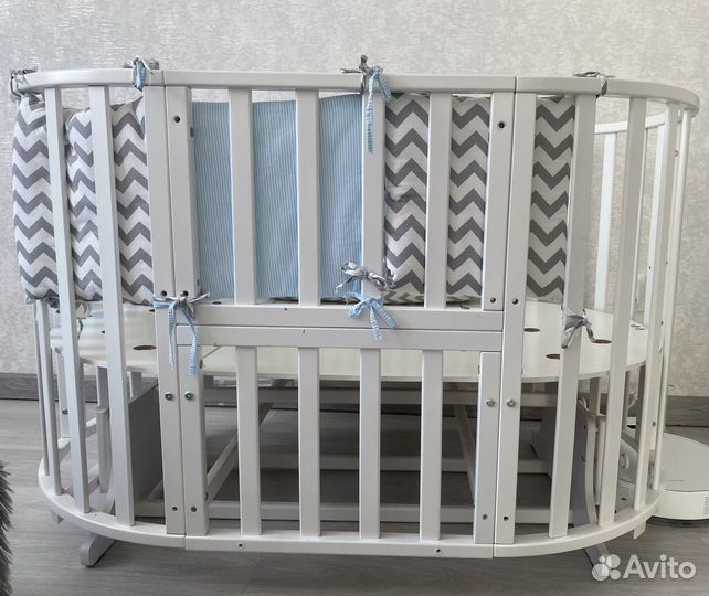 Детская кроватка с поперечным маятником