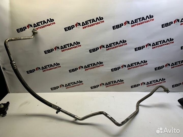 Трубка кондиционера Nissan Almera N16 седан 1.5