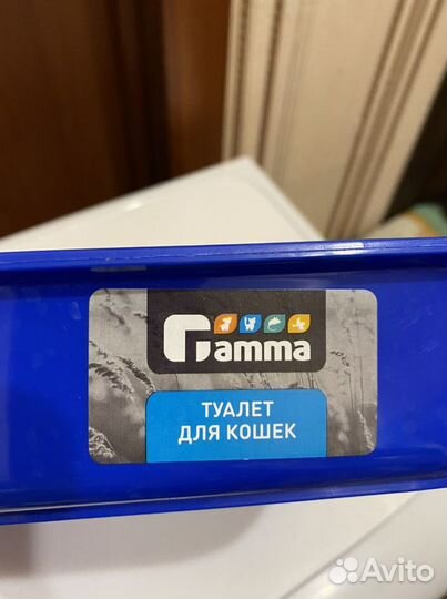 Лоток для кошек и жидкость для приучения к лотку