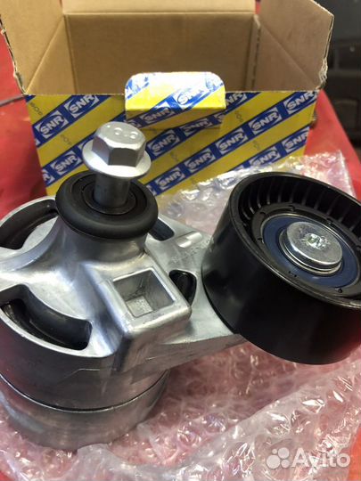 Ролик с натяжителем приводного ремня