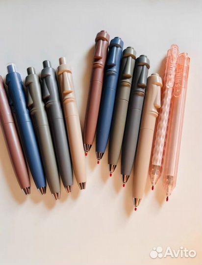 Ручка - моаи, каменное лицо