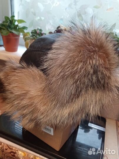 Шапка ушанка с мехом енота
