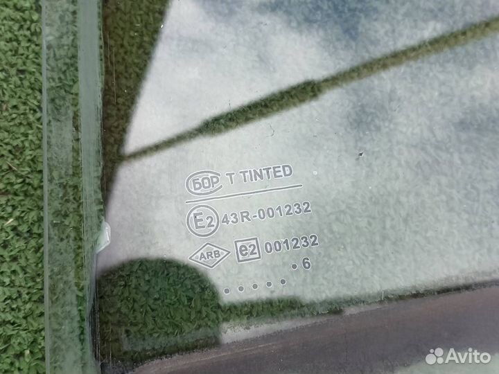 Стекло дверное заднее левое Renault Logan седан