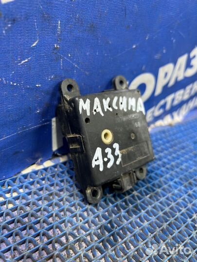 Моторчик заслонок отопителя Nissan Maxima A33