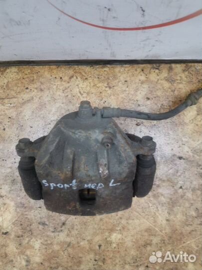 Суппорт передний левый Kia Sportage 2 SUV 2.0 crdi