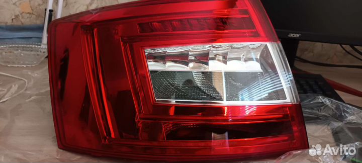 Заданий левый фонарь Skoda Octavia а7