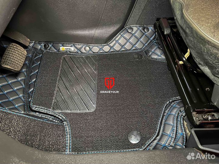 Автоковрики в багаж Opel Zafira