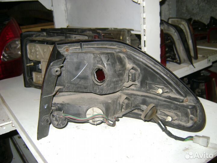 Фонарь внешний левый Мазда 626 гф Mazda 626 GF