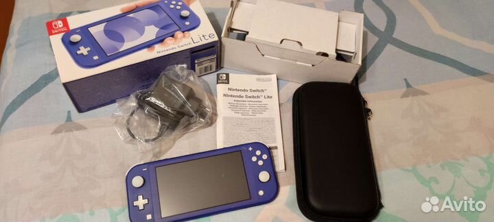 Nintendo Switch Lite, шитая 160гб., + игры