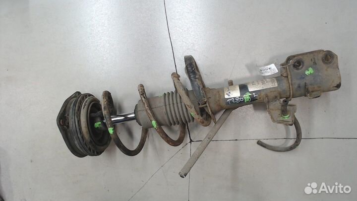 Амортизатор подвески Nissan Note E11, 2006