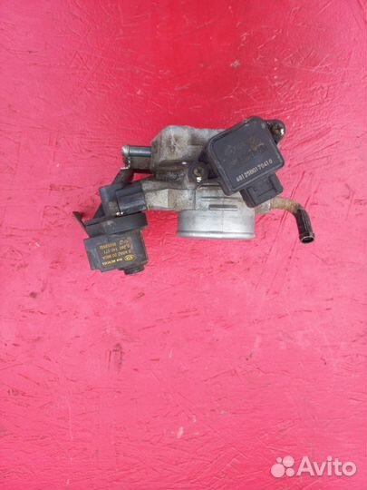 Дроссельная заслонка Kia Spectra