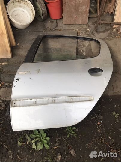 Дверь peugeot 206