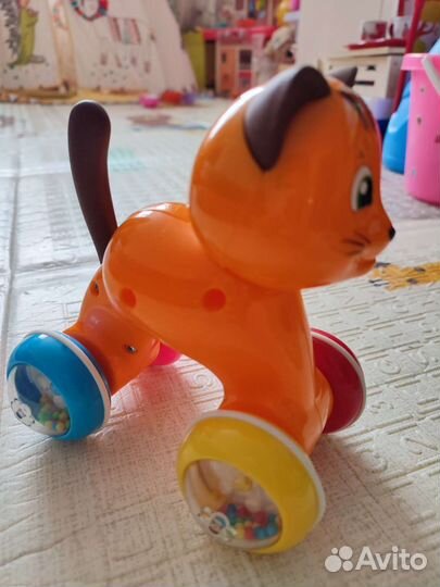 Игрушка каталка