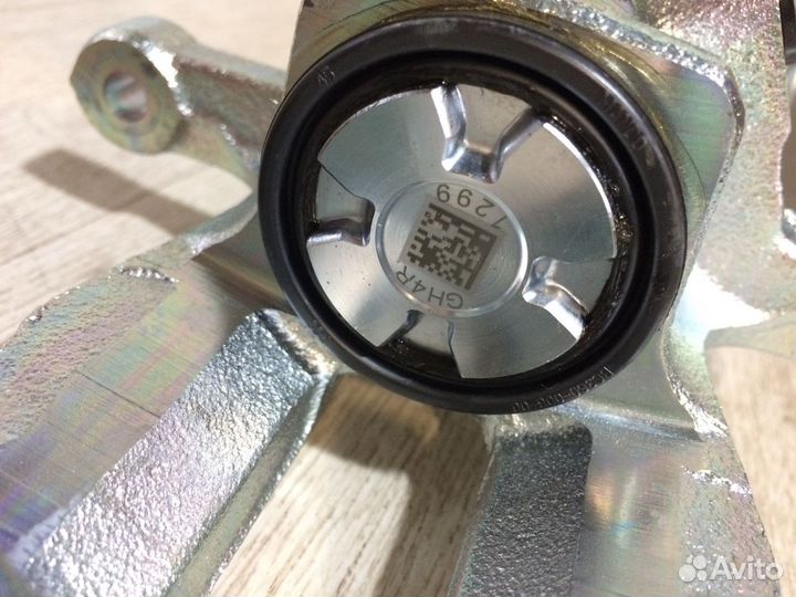 Суппорт задний левый оригинал новый Солярис Рио 3