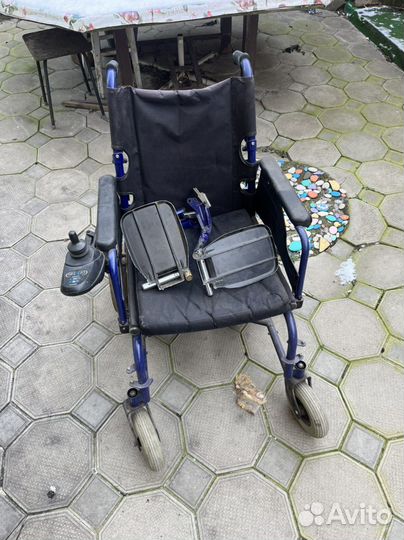 Коляска инвалидная на электротяге