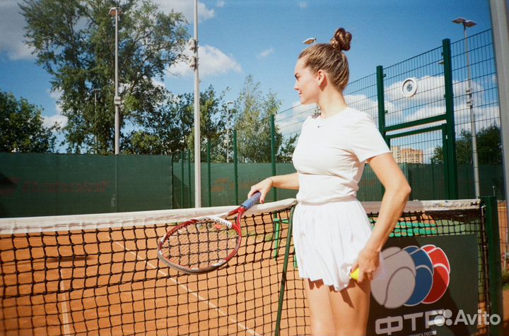 Тренер по большому теннису