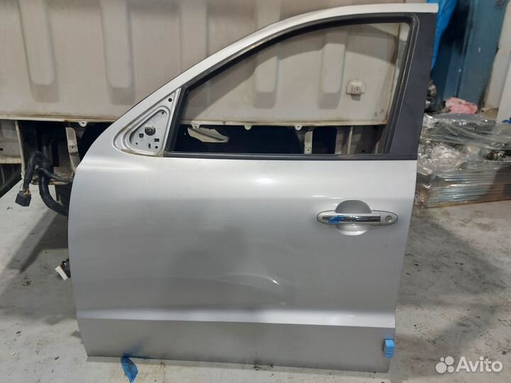 Дверь лева передняя Santa Fe 760032B010 2005-10г