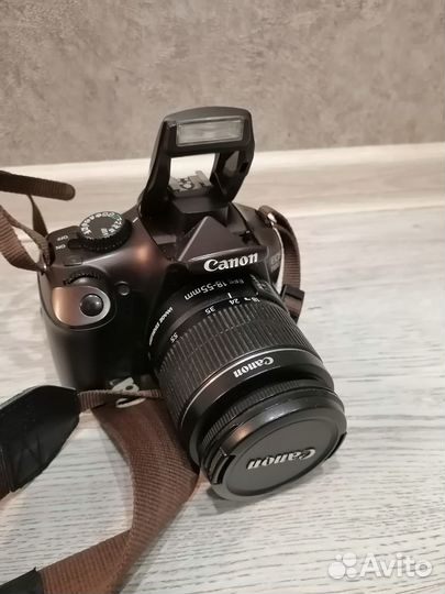 Зеркальный фотоаппарат Canon EOS 1100D, коричневый